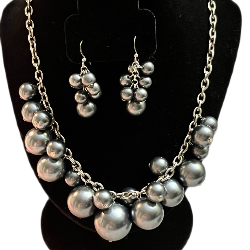 Silver colored bead necklace and earring set